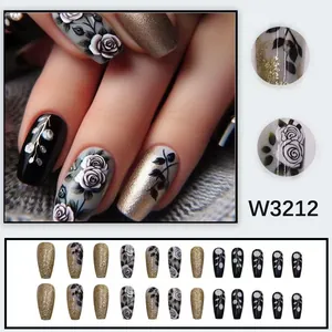 Close-up of elegant black and gold rose pattern press-on nails in trapezoid shape