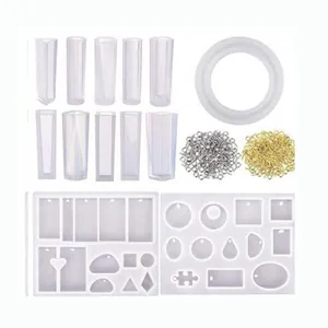 Professional DIY resin jewelry making kit with multiple silicone molds and metal eye pins.
