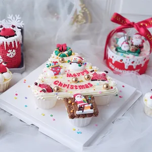 Set di topper per cupcake a forma di albero di Natale con Babbo Natale e pupazzo di neve