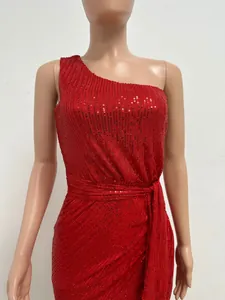 Exquisite red one-shoulder sequin evening gown featuring pleated waist and tie belt detail