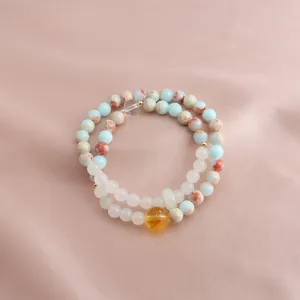 Detailed macro view of New Chinese style double-strand natural stone beaded bracelet