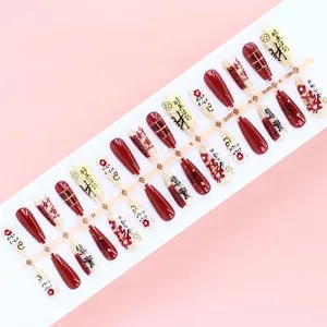 Set of 30 semi-handmade press-on nails on strip in luxury red and gold Chinese style