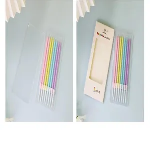 8-piece rainbow pencil cake candles set in transparent box and white paper sleeve