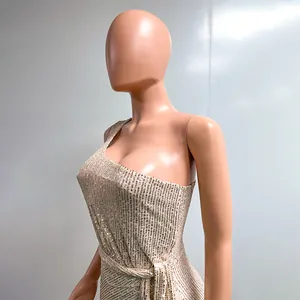 Elegant champagne one-shoulder sequin evening dress with pleated waist tie detail.