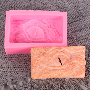 Detailed dragon eye texture in a silicone mold with finished resin or soap piece