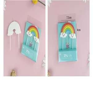Detailed view of rainbow cake topper candle with cloud design and size measurements 7.3x4cm.