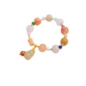 Natürliches Golden Silk Jade Perlenarmband mit Kürbisperlen und Kürbisanhänger für Damen
