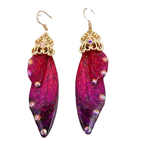 Vintage butterfly wing drop earrings featuring purple gradient and sparkling rhinestones