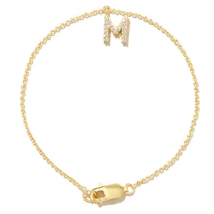 Gold-plated chain bracelet with a shimmering zircon-encrusted initial M pendant