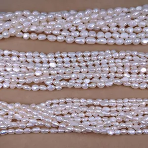 Macro view of 4-8mm white irregular baroque freshwater pearl strands for jewelry making
