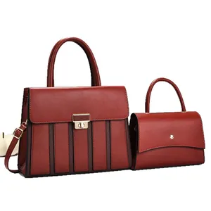 Stylish 2-piece red handbag set with striped stitching and gold hardware details