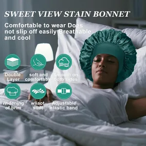 Detail of a deep green satin bonnet worn by a model in a cozy bedroom sleep setting