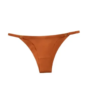 Nahtlose orangefarbene Unterwäsche mit niedriger Taille und goldenen Ringverschlüssen für Damen