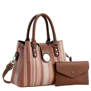 Stylish 2pcs straw woven handbag set with brown leather accents and matching wallet.