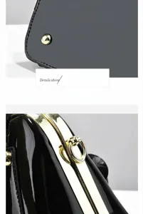 Dettaglio di borsa nera lucida con rivetto sul fondo e chiusura in metallo color oro