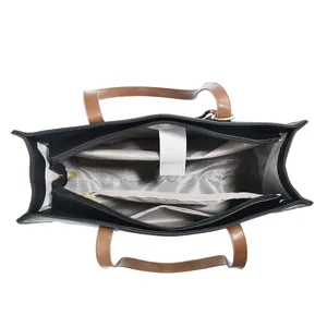Detailed interior view of large capacity tote bag showing compartments and pockets