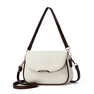 Elegant cream white crossbody bag with brown trim and dual straps for women