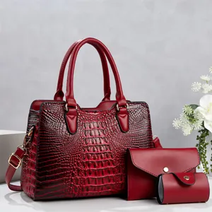 Elegant three-piece red crocodile embossed handbag set for stylish daily commuting wear