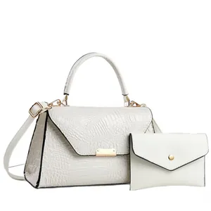 Elegante set borsa a mano e pochette a busta bianca con motivo a coccodrillo da donna