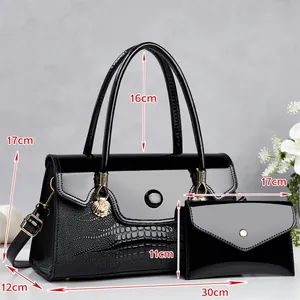 Guide des tailles détaillé pour cet ensemble sac à main et portefeuille noir croco