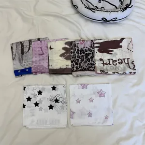 Set of American style printed square scarves with star, leopard and floral patterns