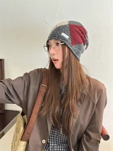 Vintage argyle knit slouchy beanie for women in a stylish autumn lifestyle setting