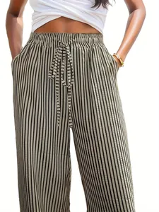 Detailed view of women's vertical striped high waist wide leg pants with a drawstring bow