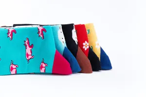Detail view of colorful cotton crew socks with vibrant farm animal patterns and textures