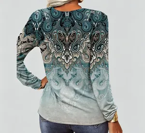 Back view detail of women's vintage ethnic paisley print long sleeve casual top