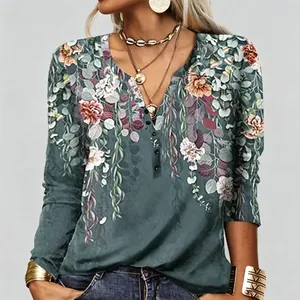 Detailed view of women's V-neck vintage floral print long sleeve top with buttons