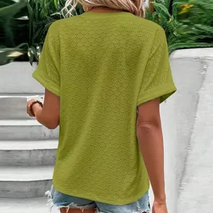 Detailed back view of a lime green eyelet textured short-sleeve casual top for women