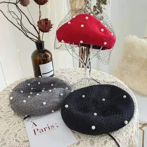 Vintage wool berets with elegant pearl mesh veils in red, grey, and black options.