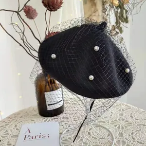 Retro black wool beret hat with elegant pearl embellishments and delicate mesh veil