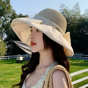 Vintage Hepburn style straw sun hat with organza bow and foldable wide brim for beach