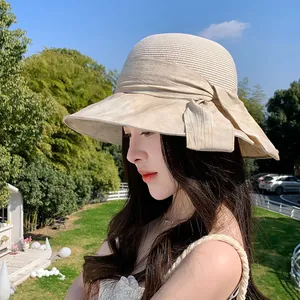 Chapeau de soleil élégant en paille à large bord avec nœud pour femmes, voyage d'été