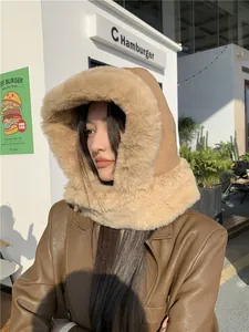 Side view of a warm furry suede hooded hat with plush trim for winter