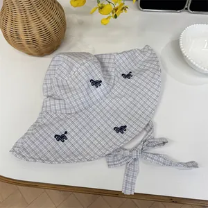 Wide brim plaid sun hat with animal embroidery and elegant bow strap for summer travel