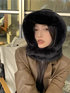 Close-up of a cozy black plush faux fur hood hat for winter warmth.