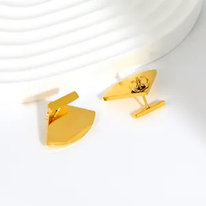 Detail showing the detachable design of gold fan-shaped stainless steel earrings.