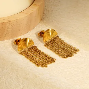 Detailed macro shot of fan-shaped earrings with gold-plated stainless steel chain tassels