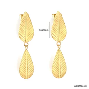Detail view of gold-plated stainless steel leaf drop earrings with 10x20mm size mark
