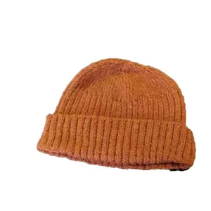 Cozy orange knitted beanie for men stylish winter warm melon cap with ribbed texture