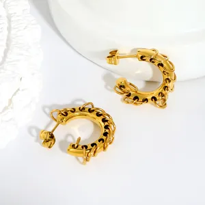 Detailed macro shot of creative 18K gold-plated stainless steel C-shaped hoop earrings