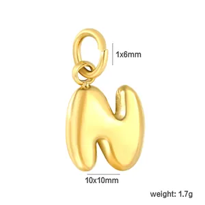 Detailed view of gold puffy letter N pendant with 10x10mm dimensions and 1.7g weight