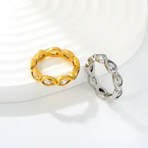 Detailed macro view of luxury stainless steel rings with sparkling water drop zircon