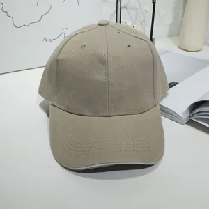 Close-up of a minimalist khaki cotton baseball cap with high-quality twill texture