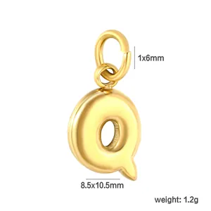 Macro detail of gold 18K plated stainless steel letter Q charm with size and weight