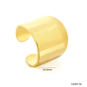 Detail view of a minimalist wide gold stainless steel C-shaped ear cuff, 14x15mm.