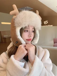 Close-up of a women's plush reindeer trapper hat with warm earflaps in a cafe setting