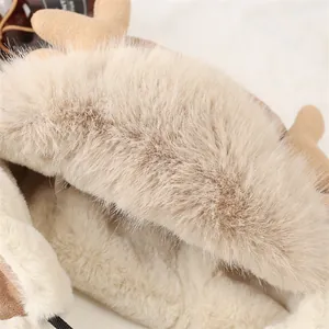 Close-up of soft faux fur and reindeer antler detail on winter windproof Lei Feng hat